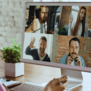 Remote worker in meeting with staff